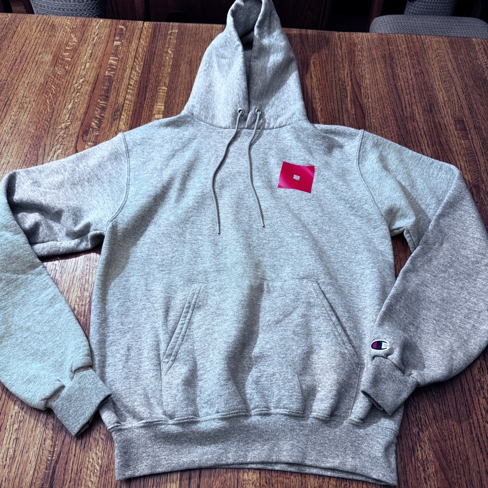 Like new, CHAMPION unisex gray hooded sweatshirt in size small